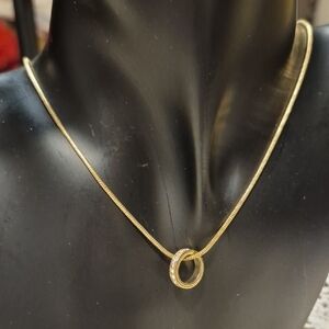 Carolina Herrera Gold Necklace with Rhinestone Ring Pendant